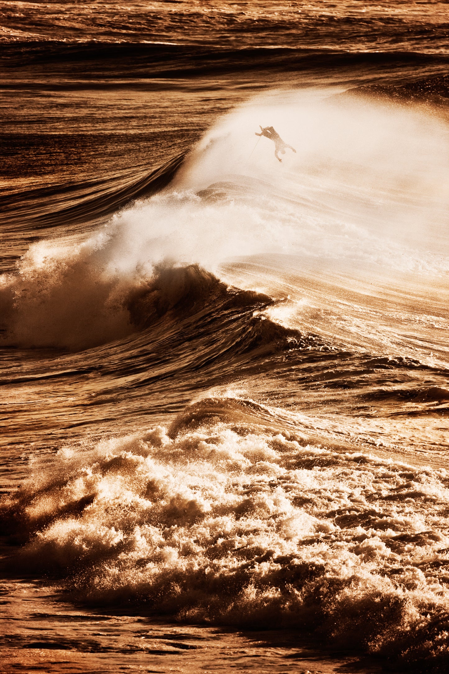 Surfer Flipping Above Wave