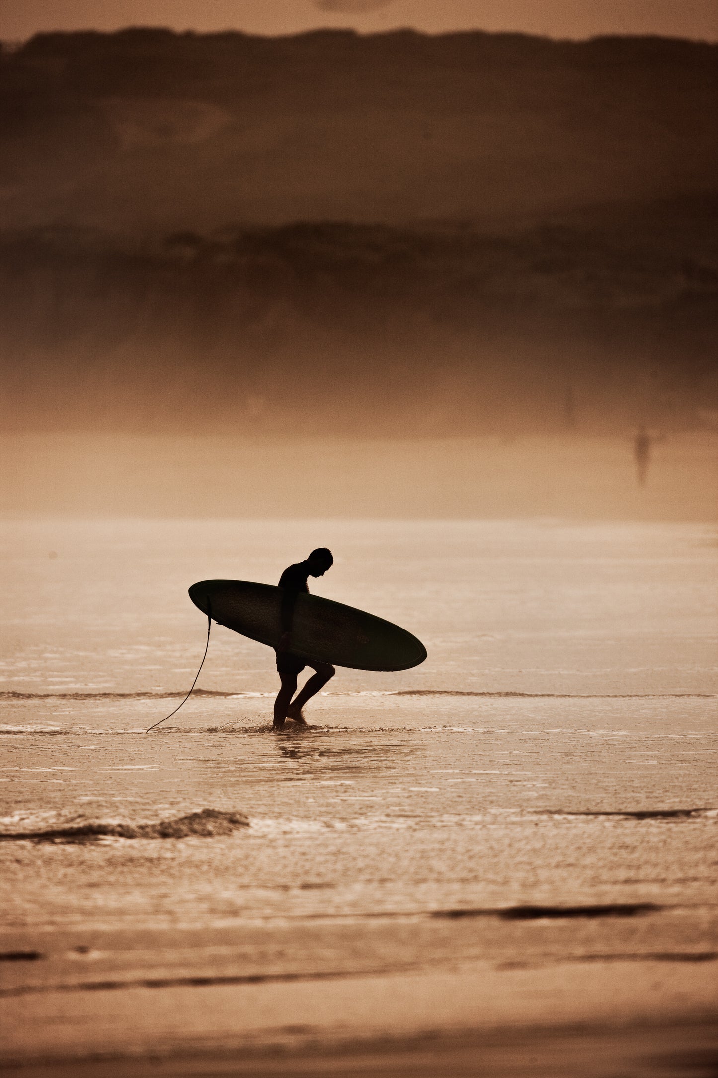 Surfer Walking with Board
